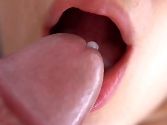 Witness the Revealing Moment: Luscious Enchantress' Soft Lips and Tongue Drive Him Wild,